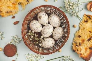 Pastel Easter eggs background. Spring greating card. Easter eggs in basket photo