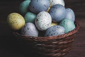 Pastel Easter eggs background. Spring greating card. Easter eggs in basket photo