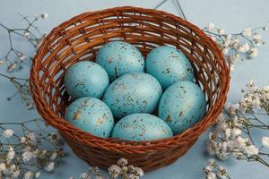 Pastel Easter eggs background. Spring greating card. Easter eggs in basket photo