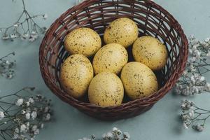 Pastel Easter eggs background. Spring greating card. Easter eggs in basket photo