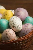 Pastel Easter eggs background. Spring greating card. Easter eggs in basket photo