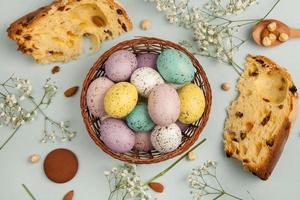 Pastel Easter eggs background. Spring greating card. Easter eggs in basket photo