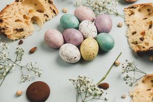 Pastel Easter eggs background. Spring greating card. Easter eggs in basket photo