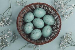 Pastel Easter eggs background. Spring greating card. Easter eggs in basket photo