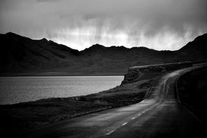 The winding mountain roads around Sailimu Lake are beautiful photo