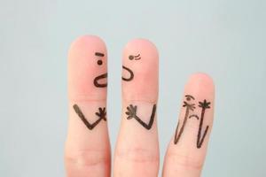 Fingers art of family during quarrel. Concept of parents quarrel, child was upset. photo