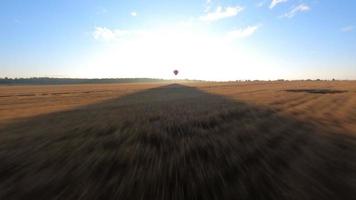 Hot Air Balloon, aerial view in the Fields video