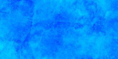 acuarela azul y textura de papel. hermosa mano de gradiente oscuro dibujada por fondo de grunge de pincel. Lavado de color agua textura pintada de cerca, diseño grungy. foto