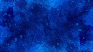 blue watercolor and paper texture. beautiful dark gradient hand drawn by brush grunge background. watercolor wash aqua painted texture close up, grungy design photo
