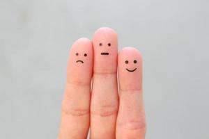 Fingers art of people. Concept of positive and negative emotions. photo