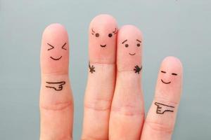 Fingers art of people. Concept woman taller than man, around laugh at them. photo