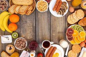 Healthy food on old wooden background. Breakfast. Top view. Flat lay. photo