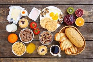 Healthy food on old wooden background. Breakfast. Top view. Flat lay. photo