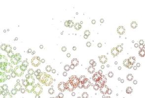 Light Green, Red vector background with bubbles.