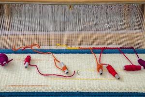 A traditional colorful vintage weaving loom. photo