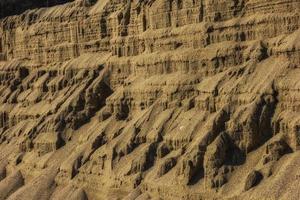 Natural sand abstract forming a textured background. photo