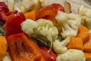 Traditional Bulgarian winter salad with pickles, cauliflower, carrots, bell peppers and garlic. Close up photo