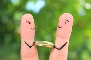 Fingers art of happy people. Concept of man giving a bribe. photo