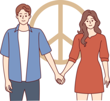 Man and woman dressed in casual style hold hands standing near symbol of pacifism png