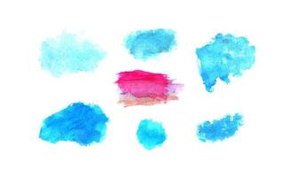 A set of watercolor stains with a pink and blue brush stroke. hand draw brush set vector