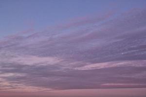 Colourful cloudy twilight beautiful sky cityscape sunset and morning sunrise. Dramatic evening night early morning view. Panoramic nature background concept. Copy space for text. World environment day photo