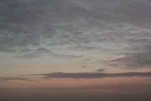 Colourful cloudy twilight beautiful sky cityscape sunset and morning sunrise. Dramatic evening night early morning view. Panoramic nature background concept. Copy space for text. World environment day photo