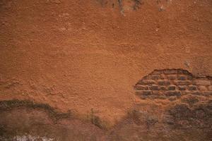 Old  brick wall red plaster texture can be used as a background wallpaper photo