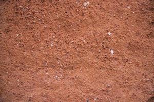 Old  brick wall red plaster texture can be used as a background wallpaper photo