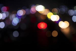 Colorful Defocus Abstract bokeh light effects on the night black background texture photo