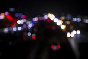 Colorful Defocus Abstract bokeh light effects on the night black background texture photo