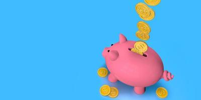 Top view of gold coins falling inside pink ceramic piggy bank standing against blue background photo