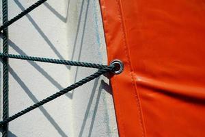 Red Canvas with Hanging Rope and Shadow. photo