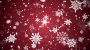 Beautiful winter snowflakes, stars and snow particles on festive red background. This Winter snow, Christmas motion background animation is a seamless loop. video