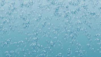 Abstract blue water motion background animation with gently rising water bubbles and particles. Full HD, 1920x1080 and a seamless loop. video