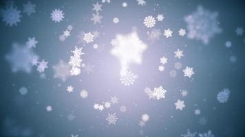 lindo inverno flocos de neve e neve partículas em azul fundo. isto inverno neve, Natal movimento fundo animação é uma desatado laço. video