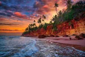 Seascape with cliff at sunset in Thailand. Nature and travel concept. photo
