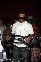 Mario trying a the Burn Machine at the BET Awards GBK Gifting Lounge outside the Shrine Auditorium in Los Angeles CA onJune 23 20082008 photo