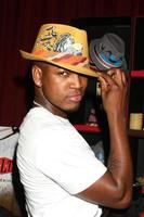 NeYo trying on a Grace Hat at the BET Awards GBK Gifting Lounge outside the Shrine Auditorium in Los Angeles CA onJune 22 20082008 photo