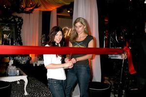 Heather Matarazzo  Fiance Carolyn Murphy cut the ribbon opening  the GBK Same Sex in The City  Wedding Show in Los Angeles CA onAugust 17 20082008 photo