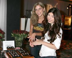 Heather Matarazzo and her Fiance Carolyn Murphy looking at rings and jewelry at  the GBK Same Sex in The City  Wedding Show in Los Angeles CA onAugust 17 20082008 photo