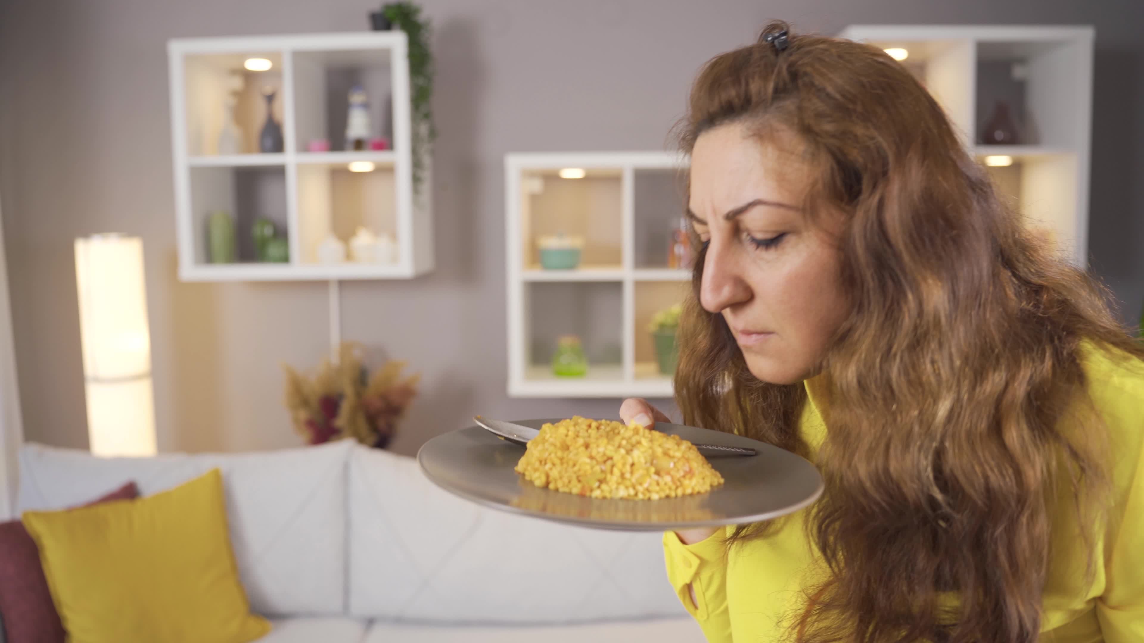 The woman who smells spoiled food nauseous. The woman who
