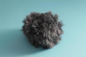 a close up of a cat fur shaped microphone silencer photo