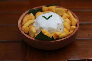 a close up of mango sticky rice photo