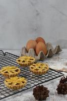 Small apple pie served on a cake rack, tastes sweet and savory. Food concept photo. photo