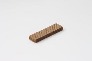 a close up of chocolate wafers isolated on white background. photo