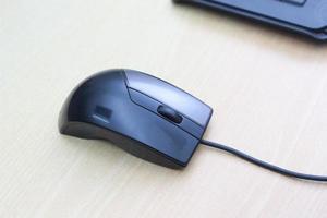 a photo of a black mouse and keyboard to work with. Technology equipment concept photo.