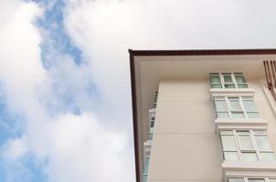 Modern building on blue sky background photo