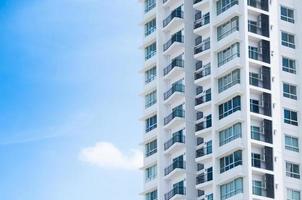 New building architecture on blue sky background,Low angle architectural exterior view of modern photo