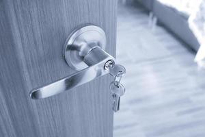 Metal door knob and keys closeup,Interior door knob in bedroom photo