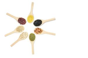 Collection set of beans and sesame on wooden spoons isolated on white background,top view photo